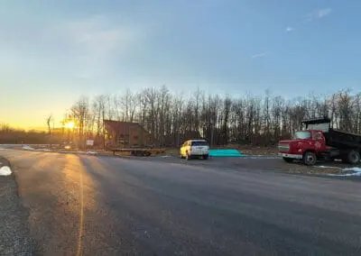 Sunset view of custom home under construction